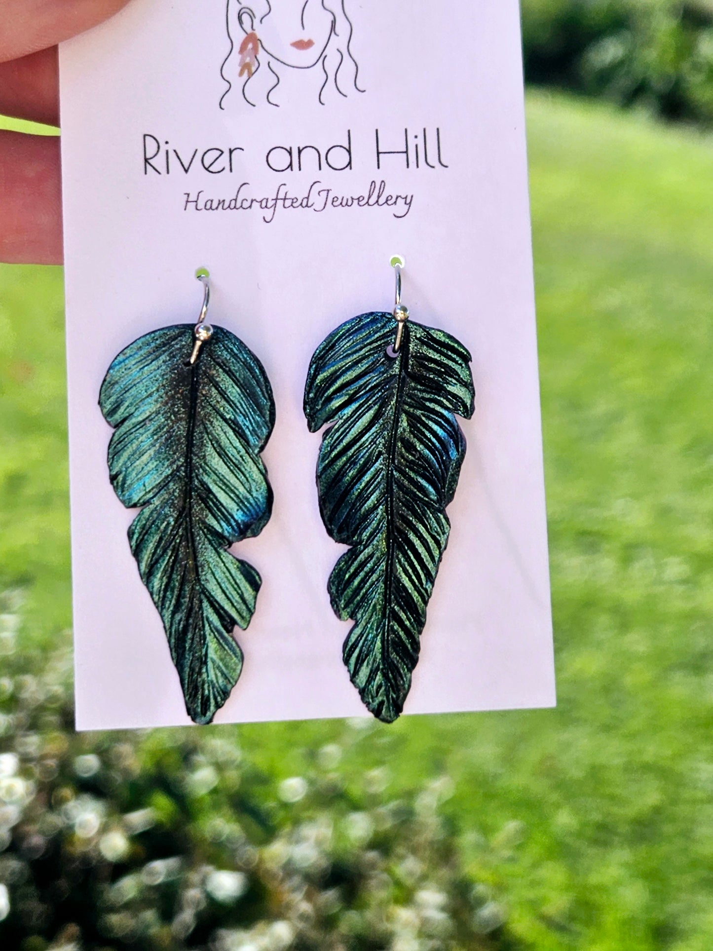 Tui Feather Earrings