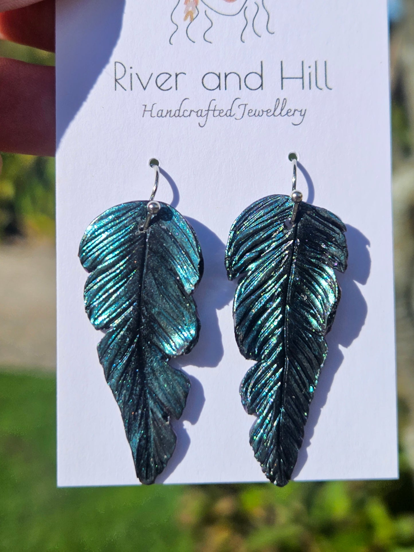 Tui Feather Earrings