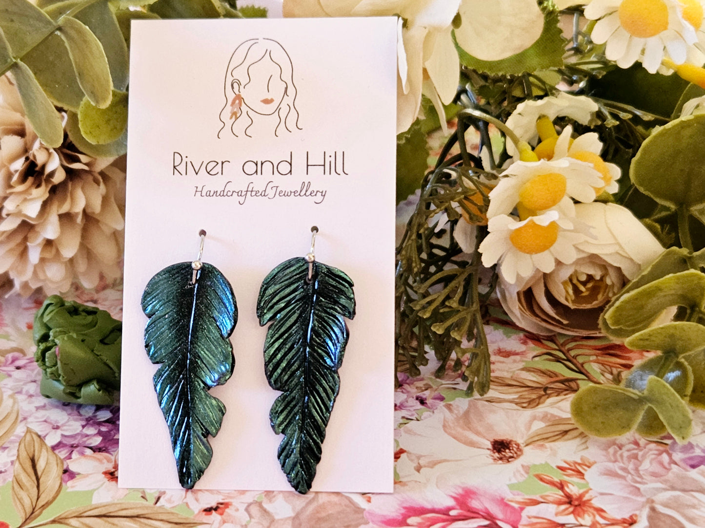 Tui Feather Earrings