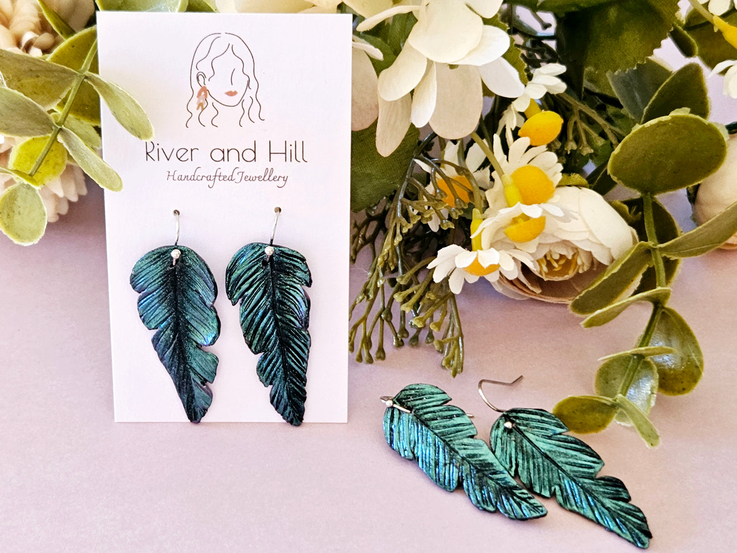 Tui Feather Earrings