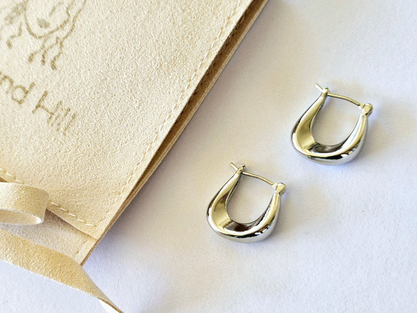 Sterling Silver Huggie Earrings