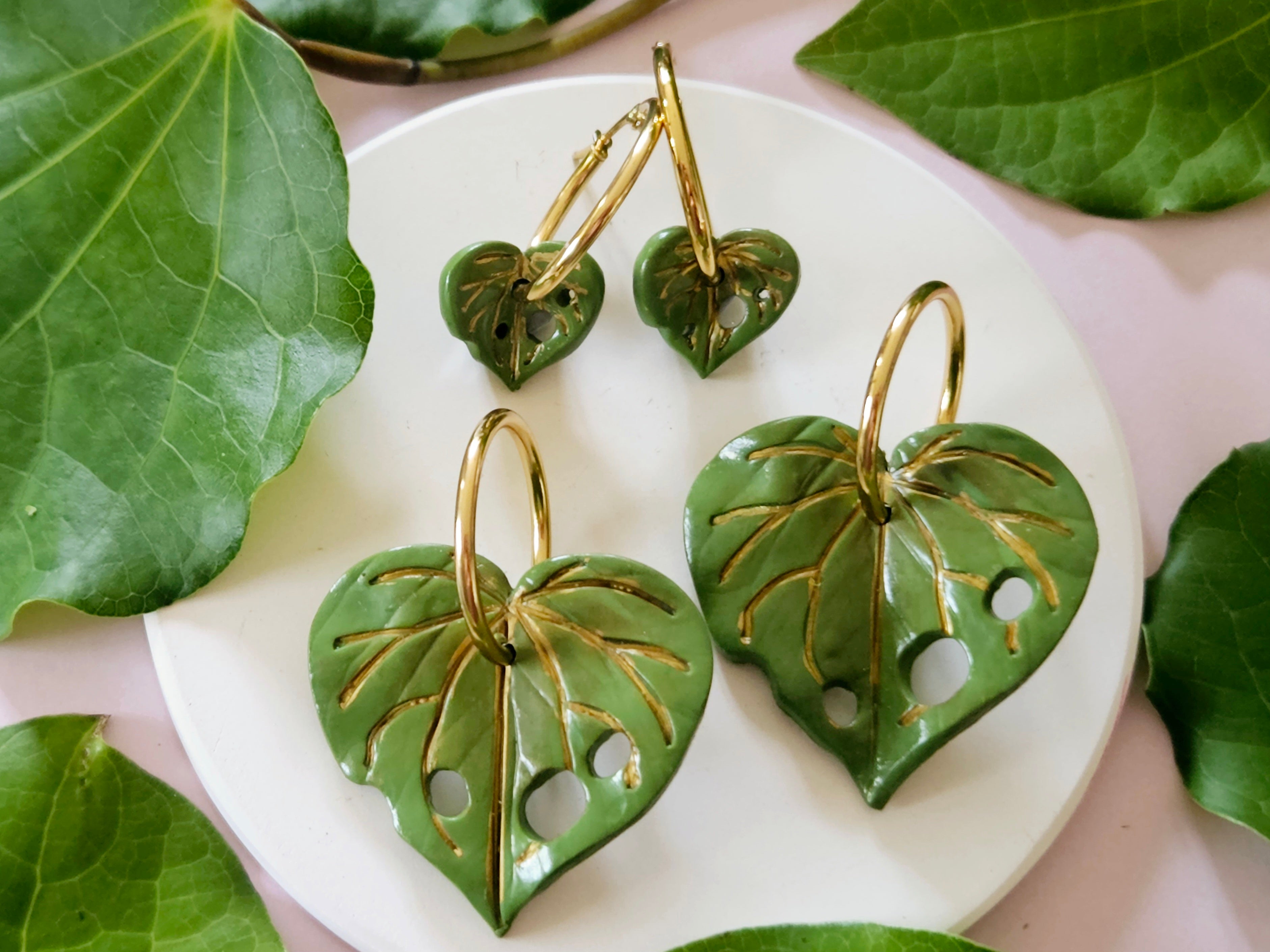 Life Tree hoop earrings with 6 offers leaves .